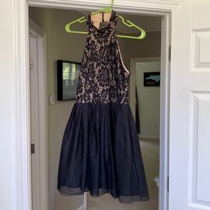 Black and nude women’s semi formal dress